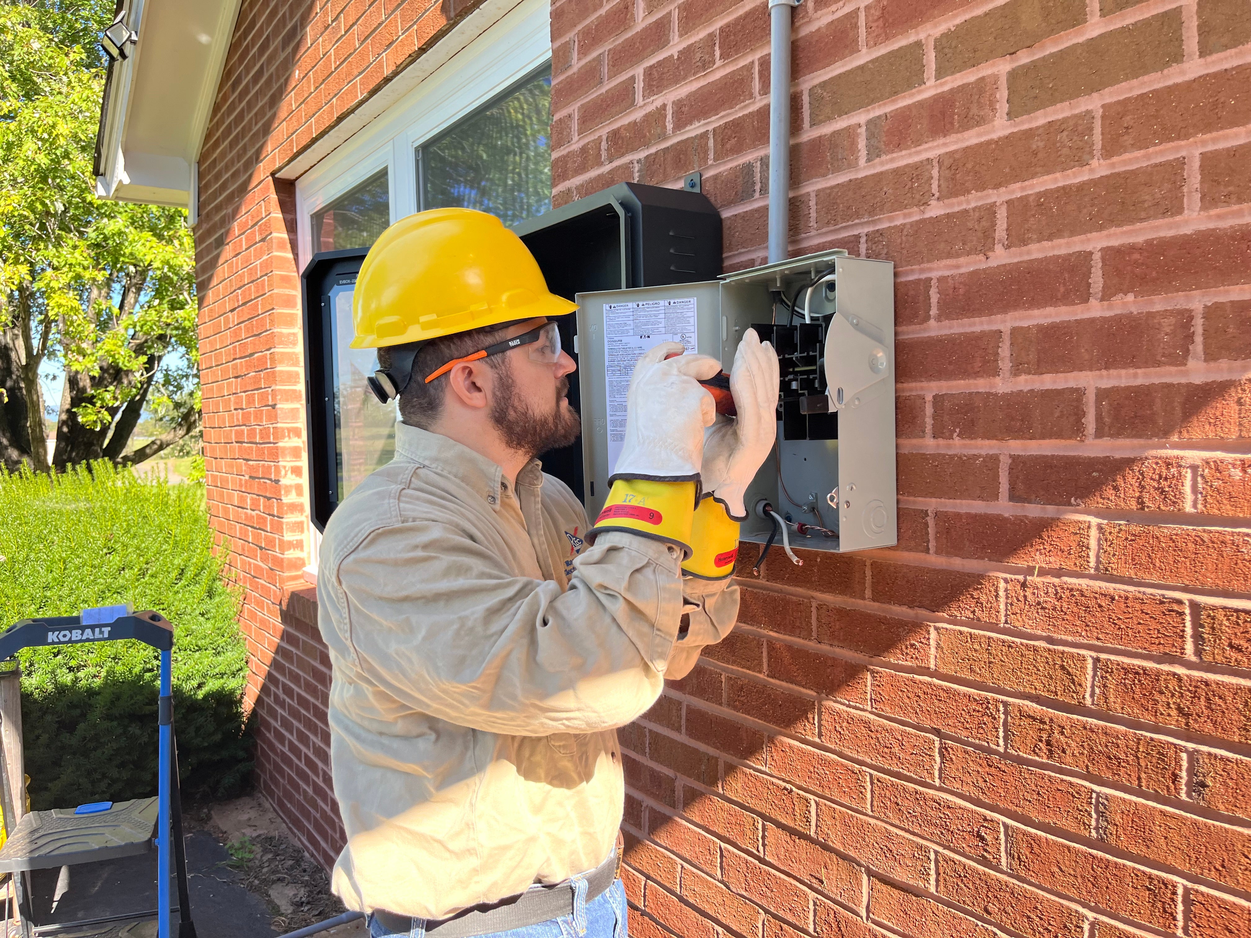 Licensed electrician completing residential electrical work