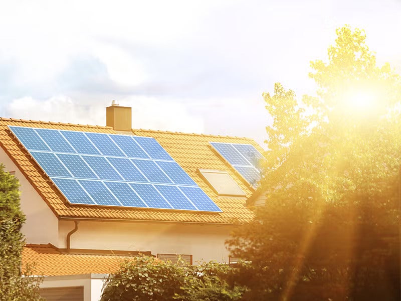 Home with rooftop solar panels